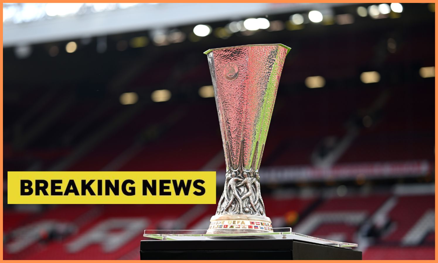 Europa League trophy at Old Trafford, plus yellow 'breaking news' banner