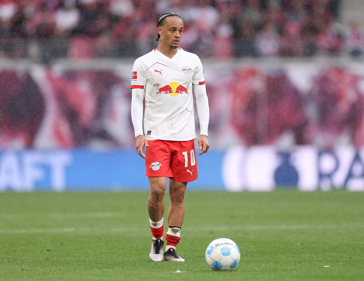 Xavi Simons stands over the ball during RB Leipzig vs Stuttgart