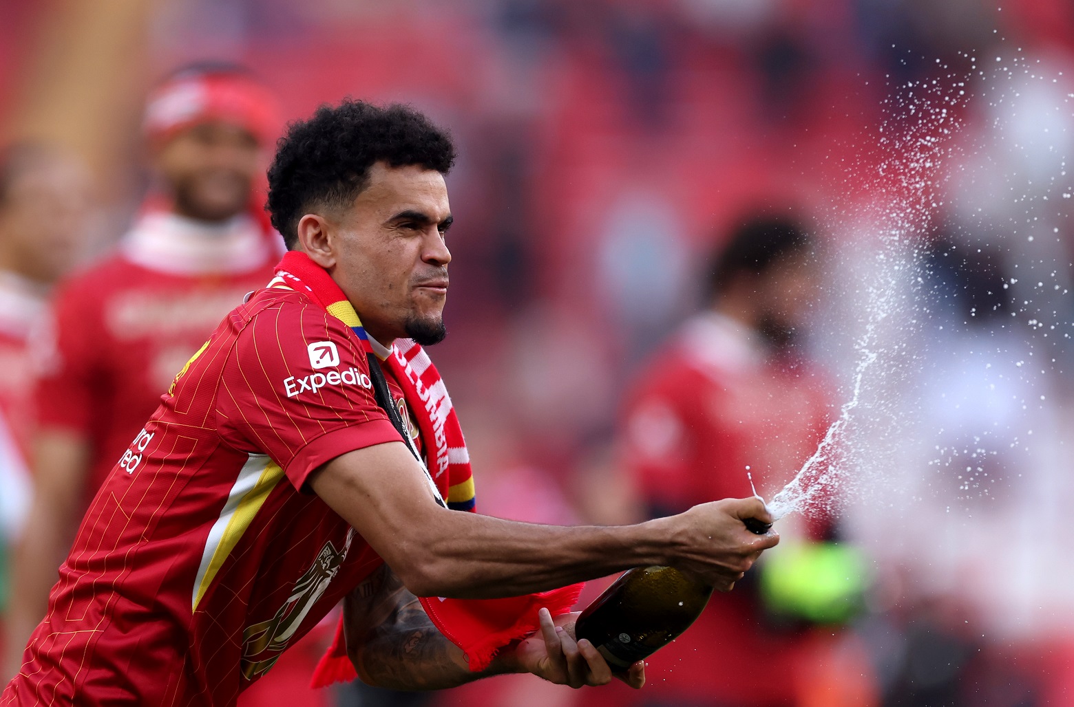 Liverpool winger Luis Diaz celebrates the title win