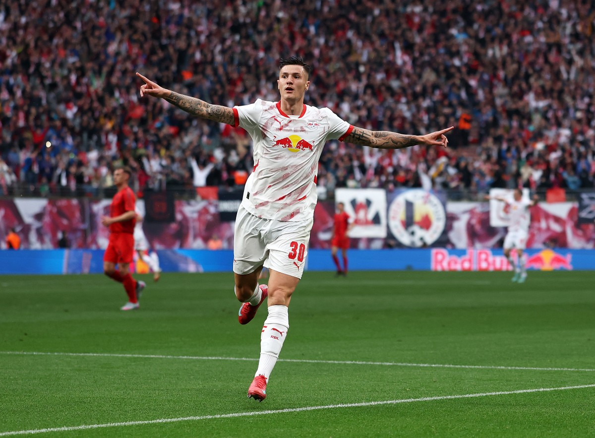 Benjamin Sesko celebrates scoring for RB Leipzig against Bayern Munich