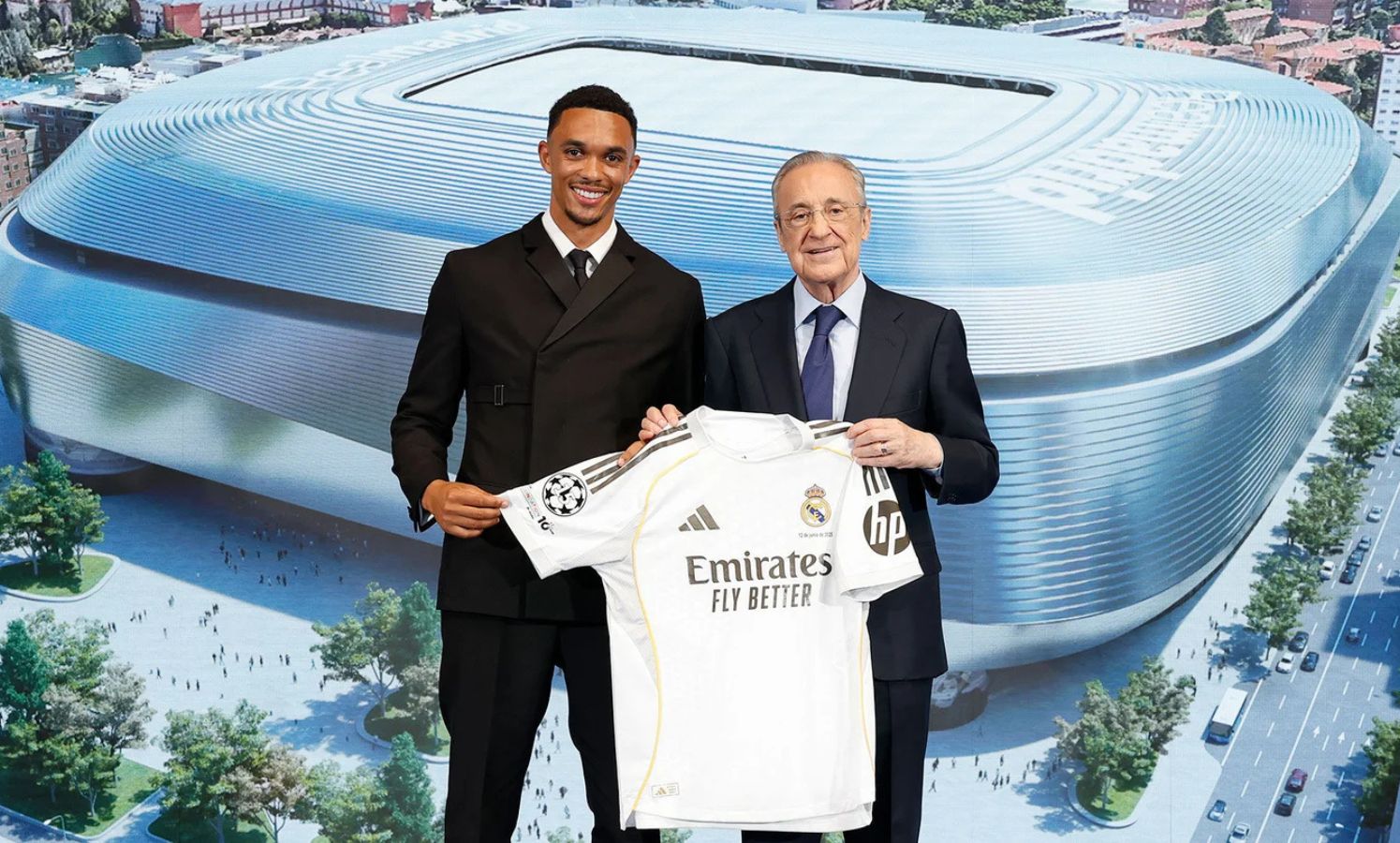 Trent Alexander-Arnold holding a Real Madrid shirt with Florentino Perez