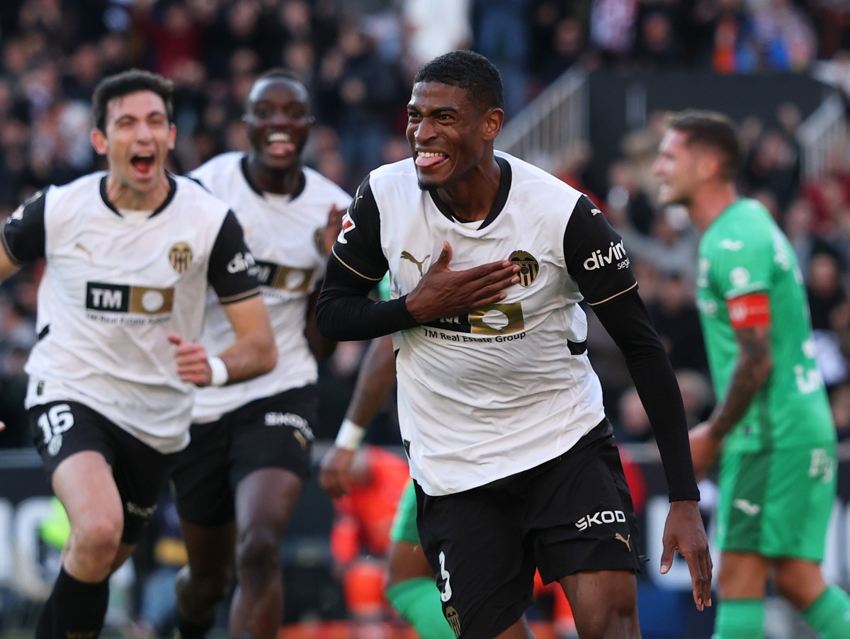 Cristhian Mosquera celebrates a goal for Valencia