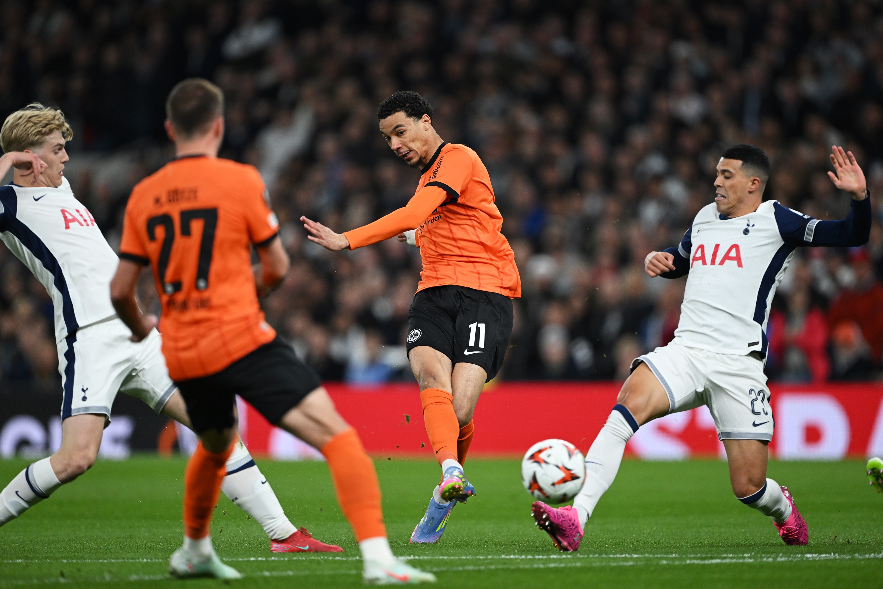 Hugo Ekitike fires a shot against Tottenham.