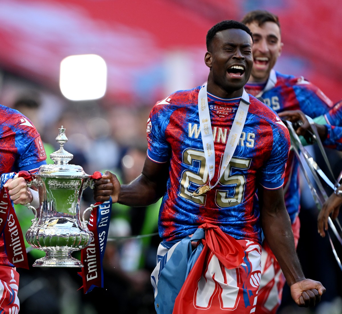 Marc Guehi celebrates Crystal Palace's FA Cup final victory