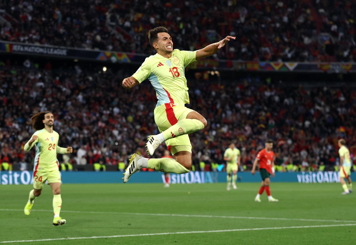 Martin Zubimendi celebrates scoring for Spain against Portugal