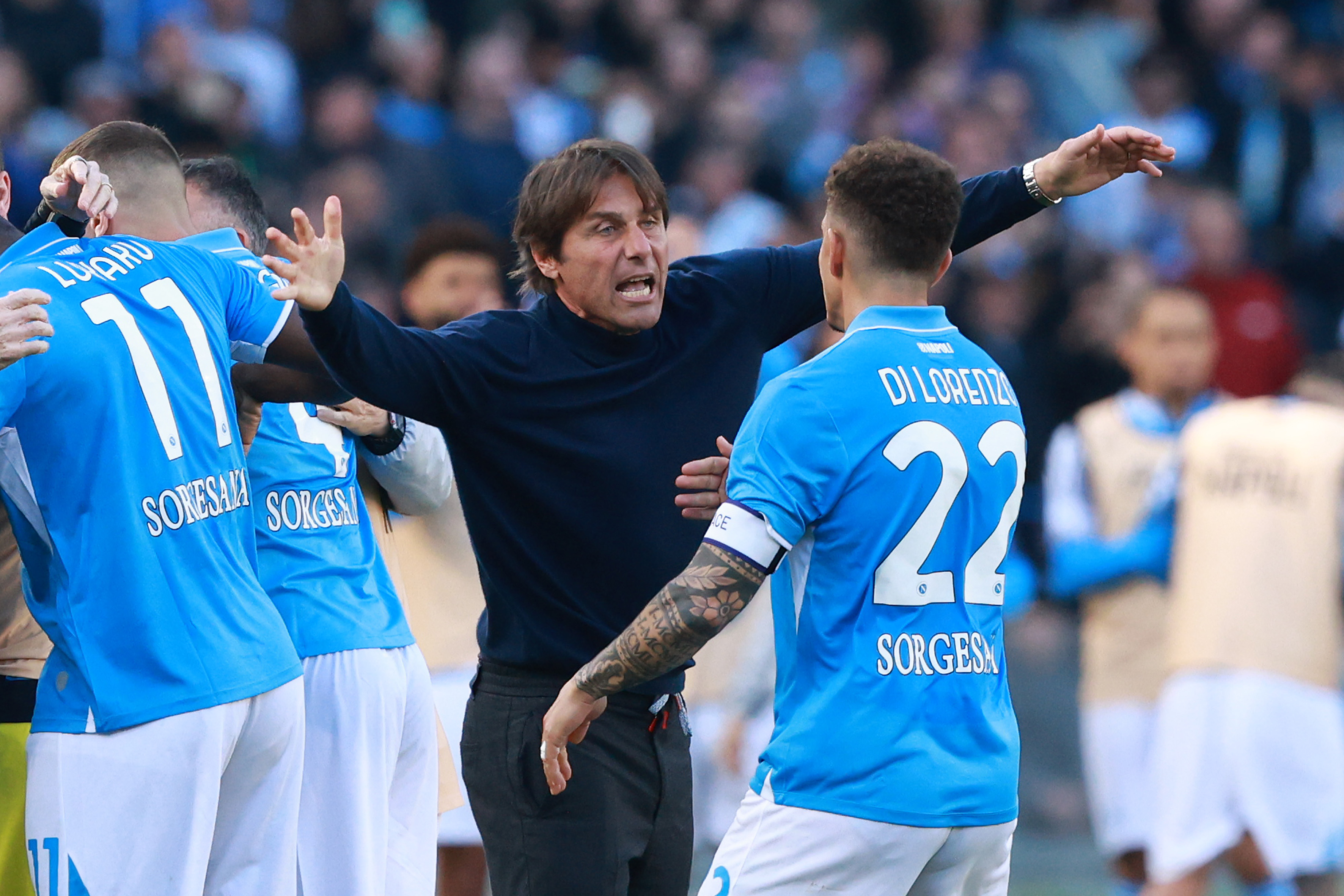 Antonio Conte celebrates with his Napoli players