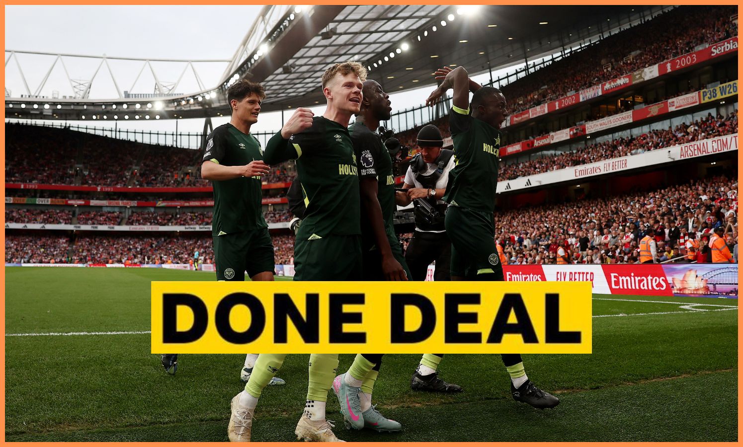 Christian Norgaard celebrates with his Brentford teammates at the Emirates Stadium