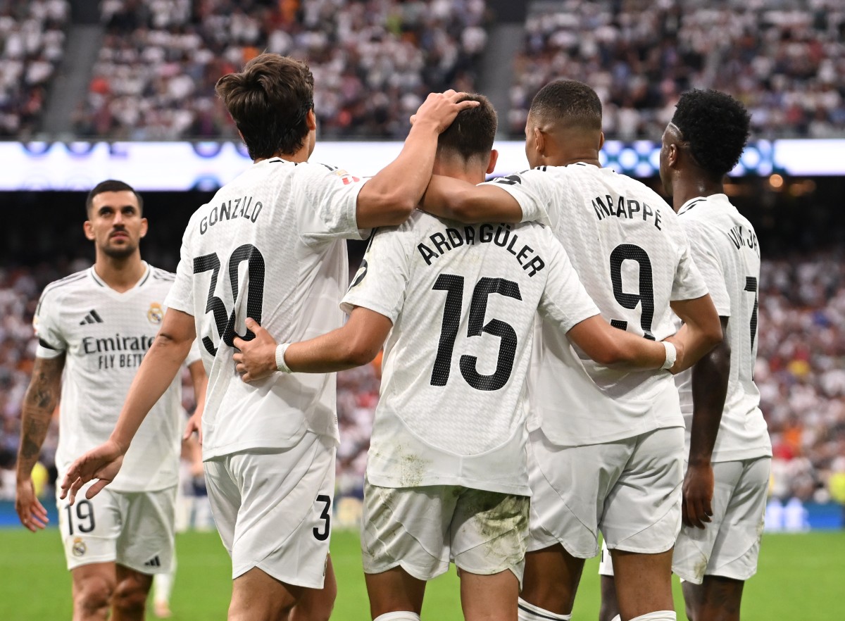 Kylian Mbappe celebrates with his Real Madrid teammates
