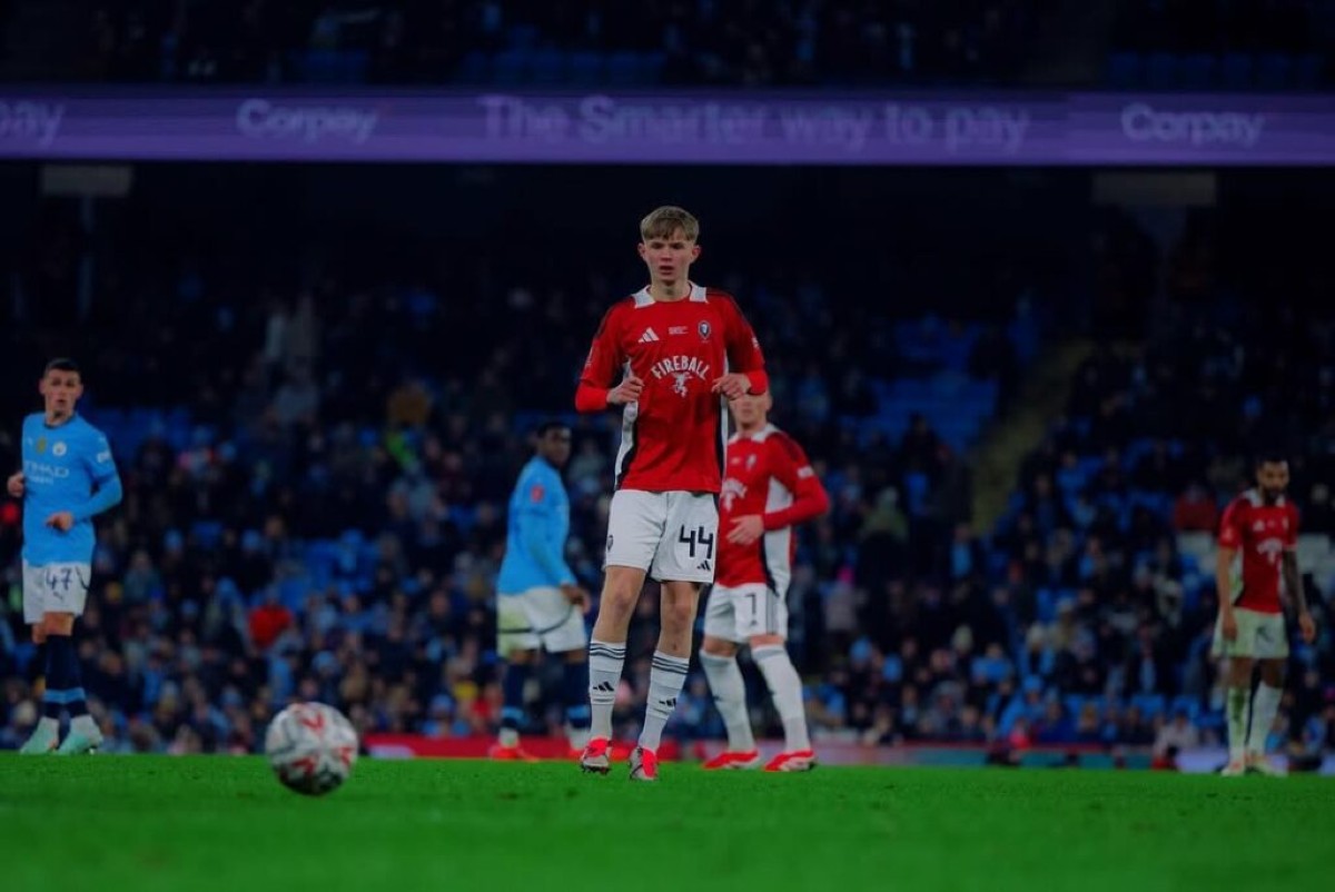 Will Wright in action for Salford City against Manchester City