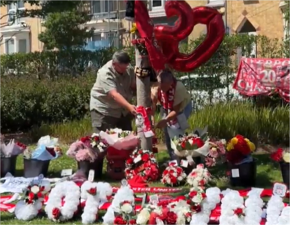 Liverpool fans pay their tributes to Diogo Jota outside Anfield