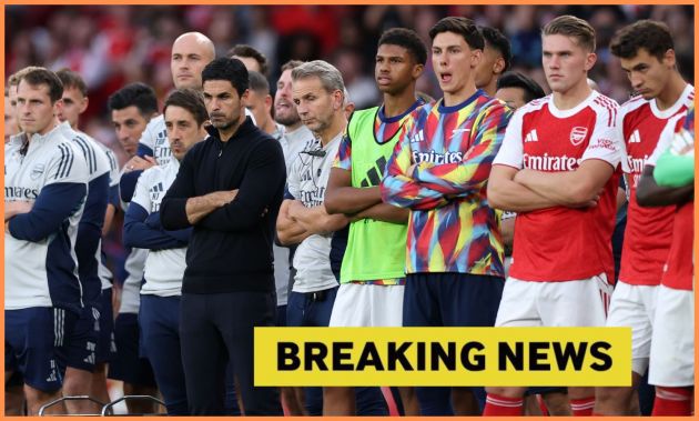 Mikel Arteta and his Arsenal players look on