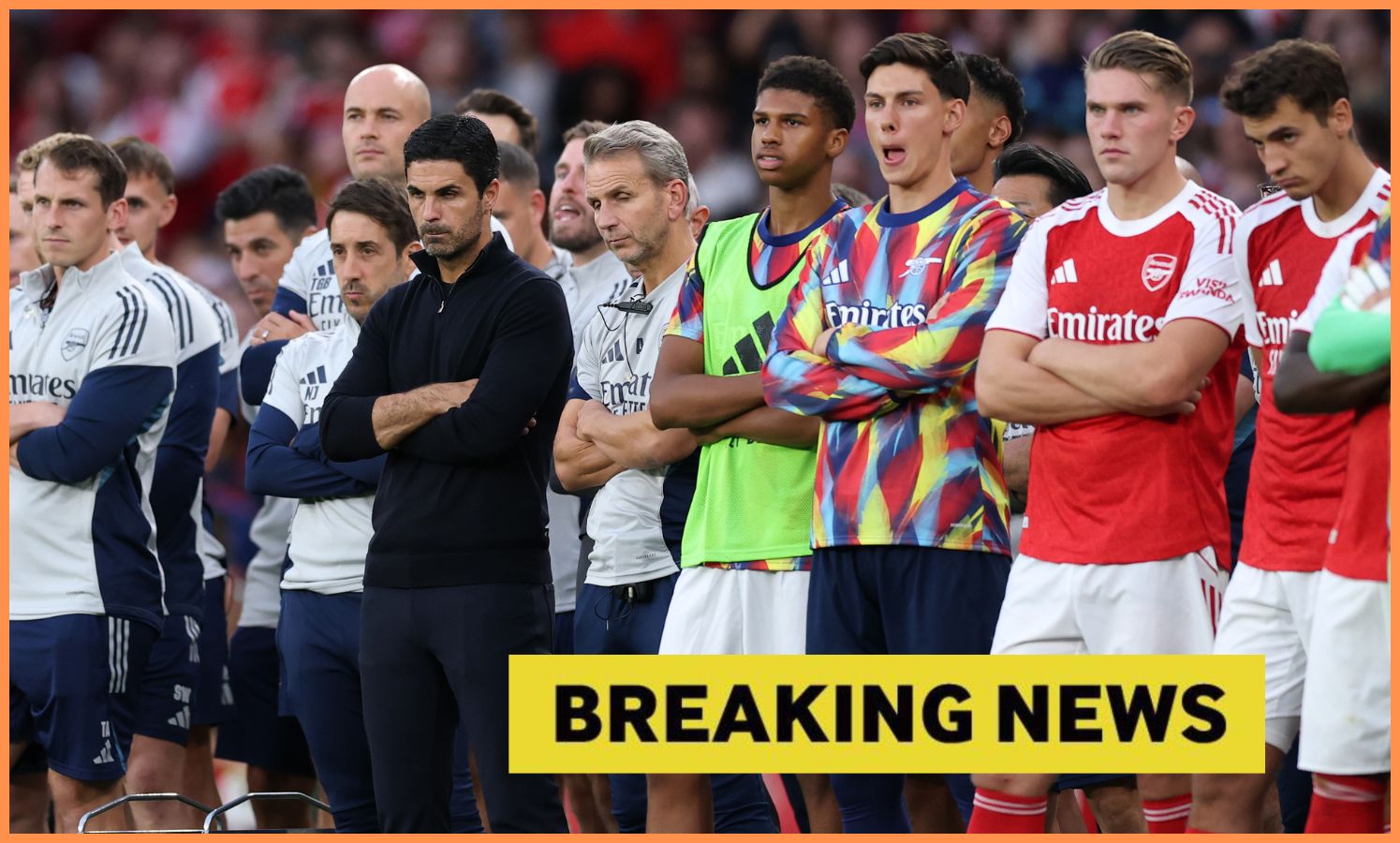 Mikel Arteta and his Arsenal players look on