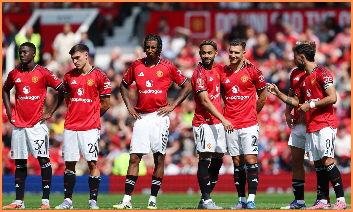 Manchester United players look on during pre-season