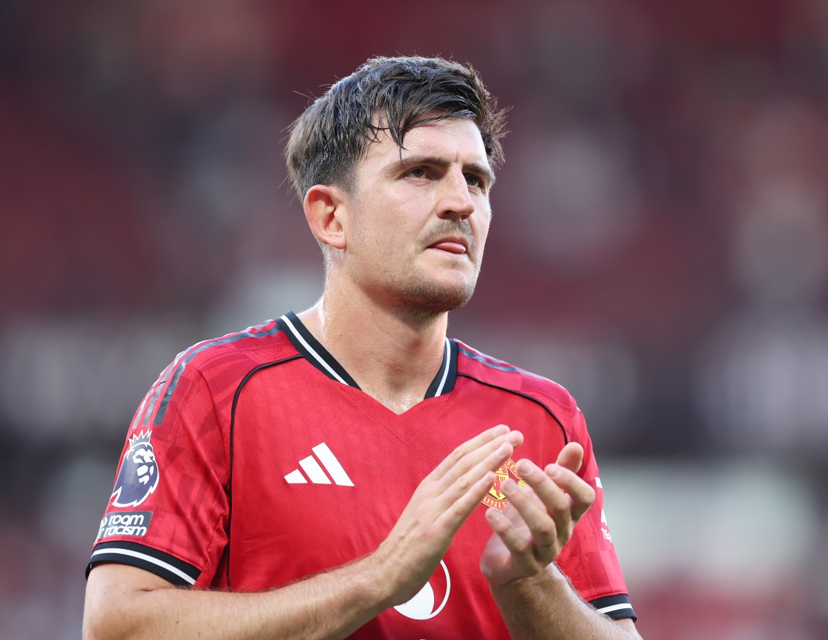 Harry Maguire applauds the Manchester United fans