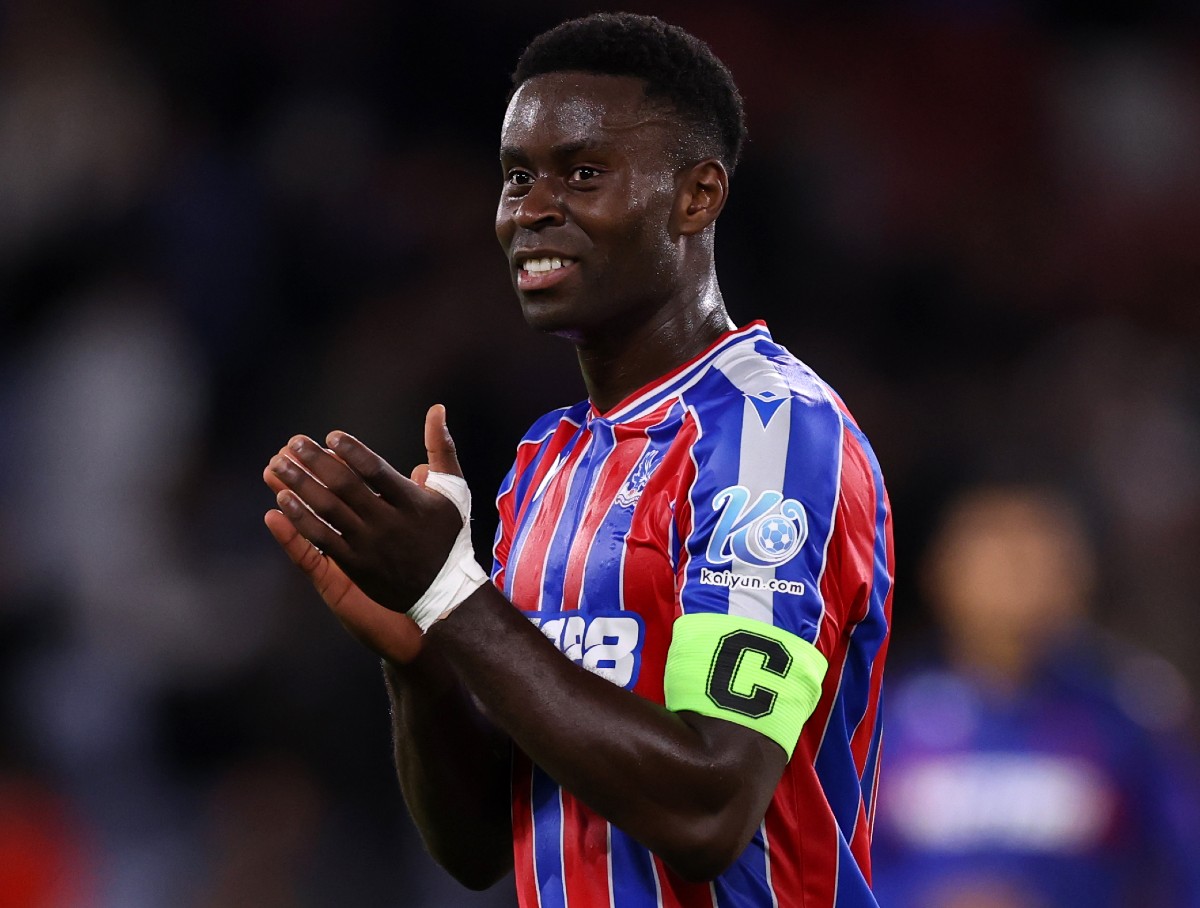 Marc Guehi applauds the Crystal Palace fans