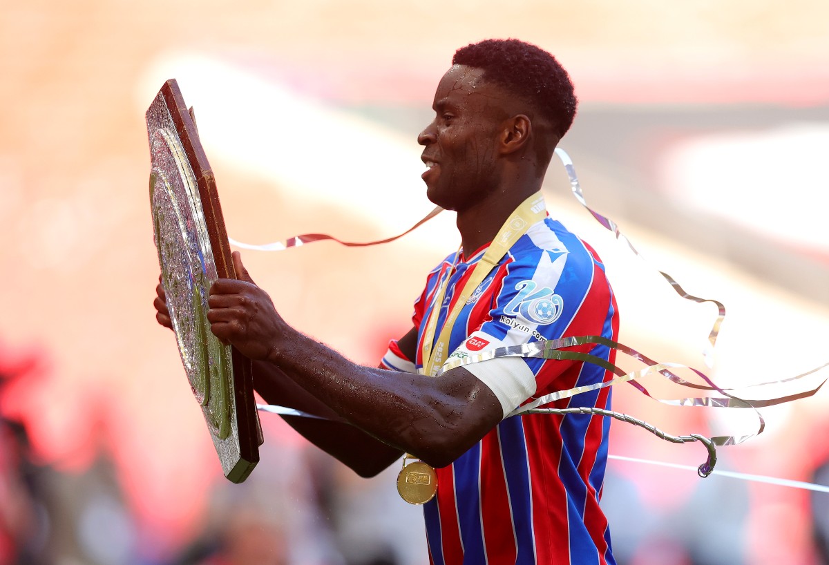 Marc Guehi lifts the Community Shield trophy