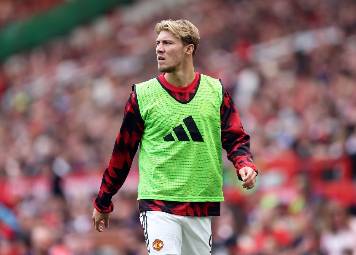 Rasmus Hojlund looks on as he warms up for Manchester United