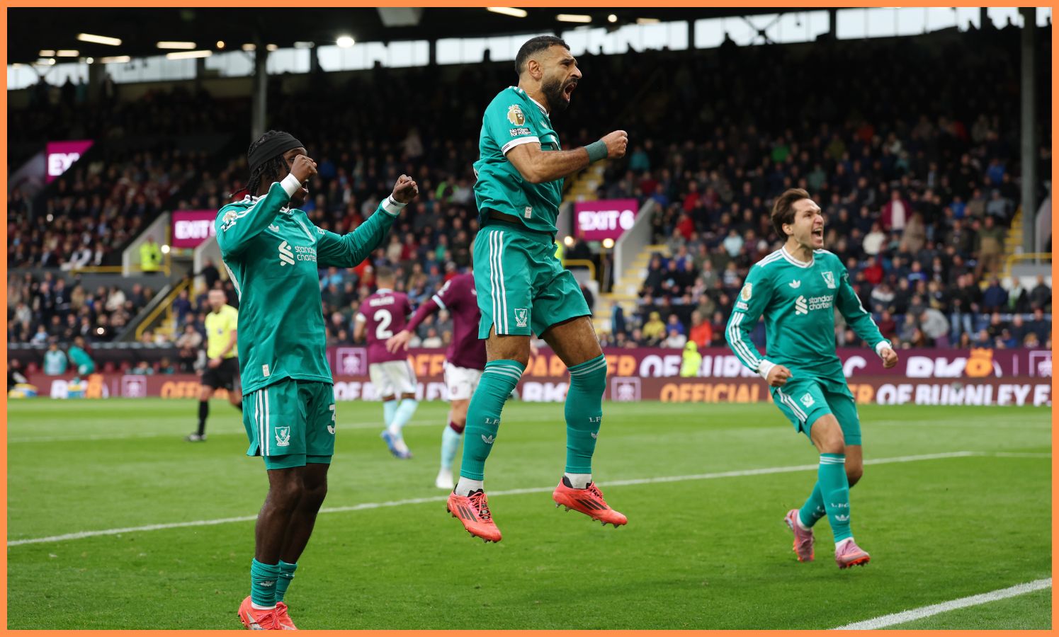 Mohamed Salah, Jeremie Frimpong, and Federico Chiesa celebrate Liverpool's late winner vs Burnley