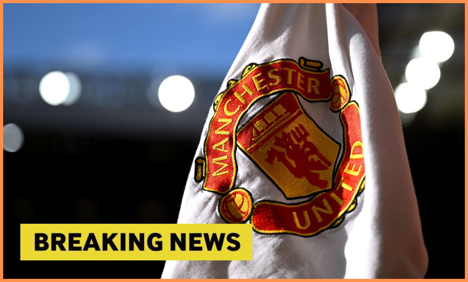 Manchester United flag and yellow 'breaking news' banner