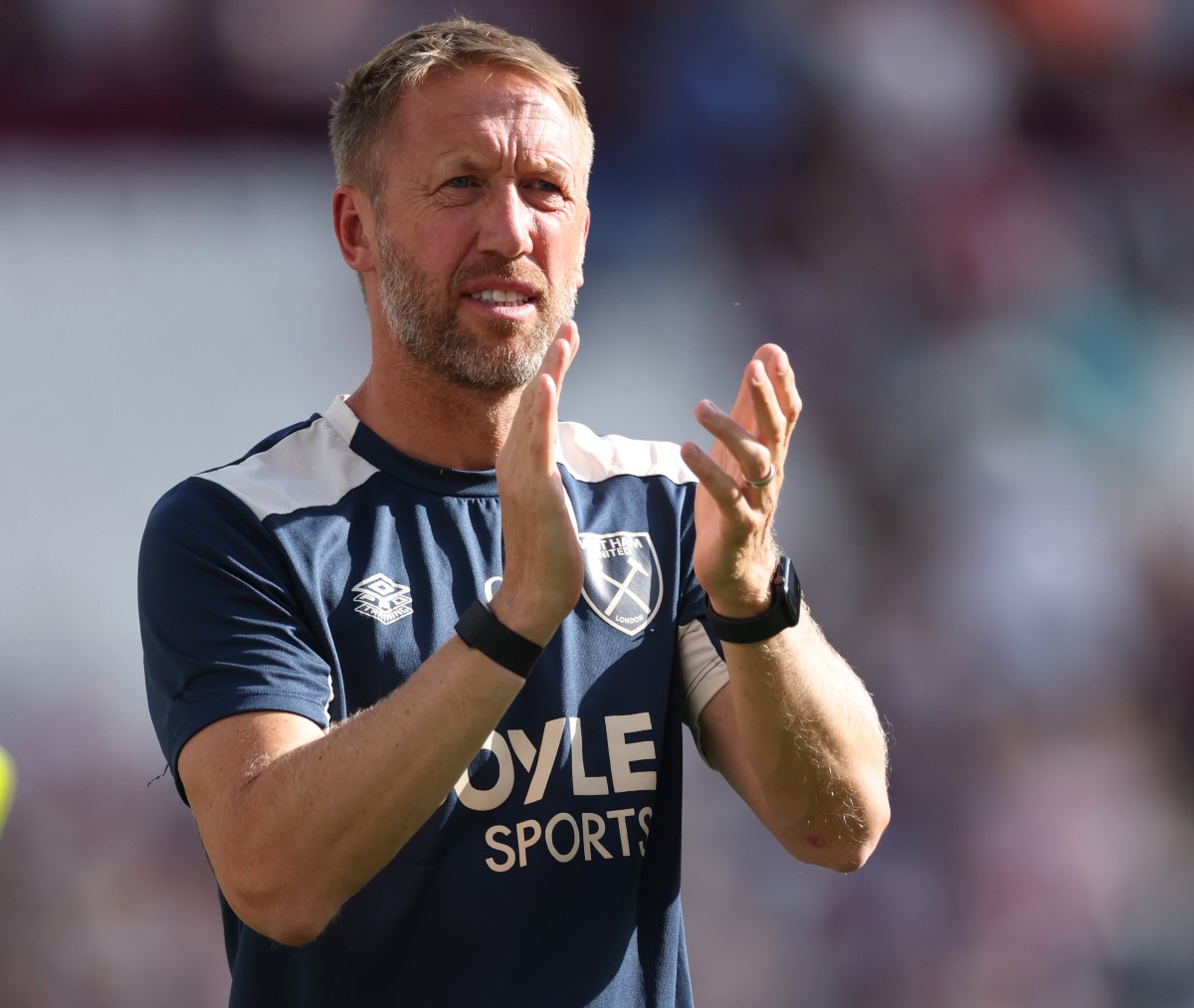 Graham Potter applauds the West Ham fans