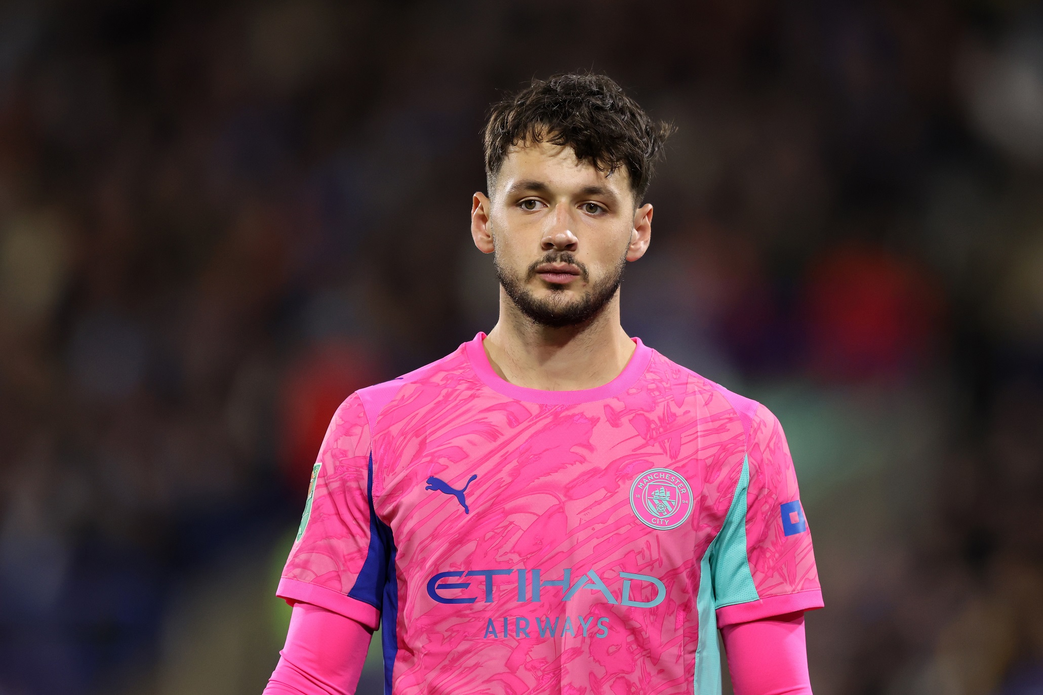 James Trafford of Manchester City looks on