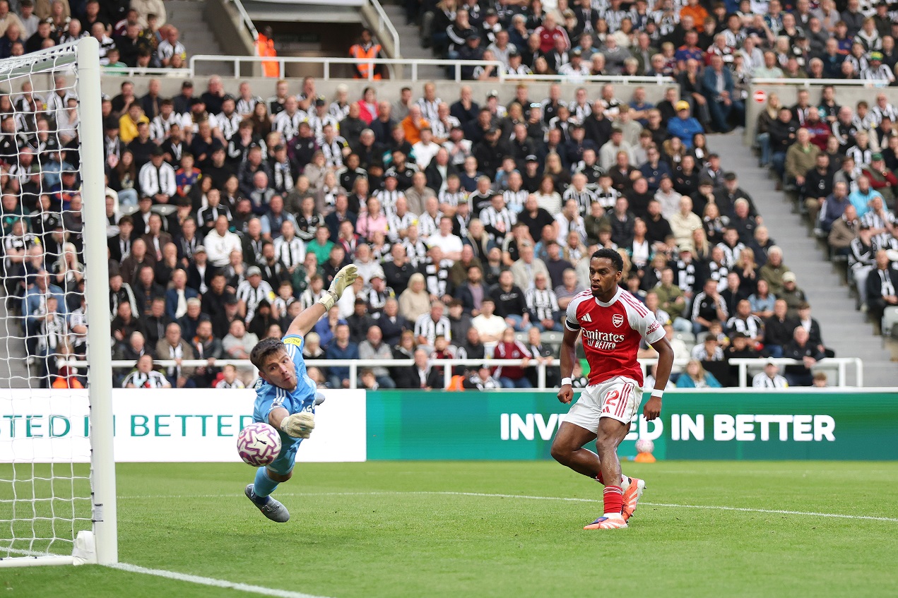 Jurrien Timber of Arsenal has a shot saved by Nick Pope