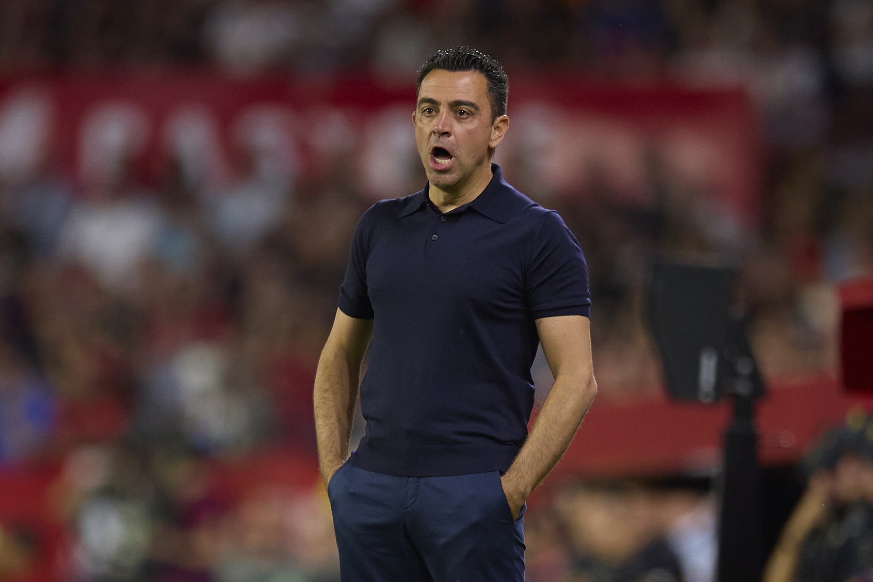 Xavi Hernandez looks on during a game