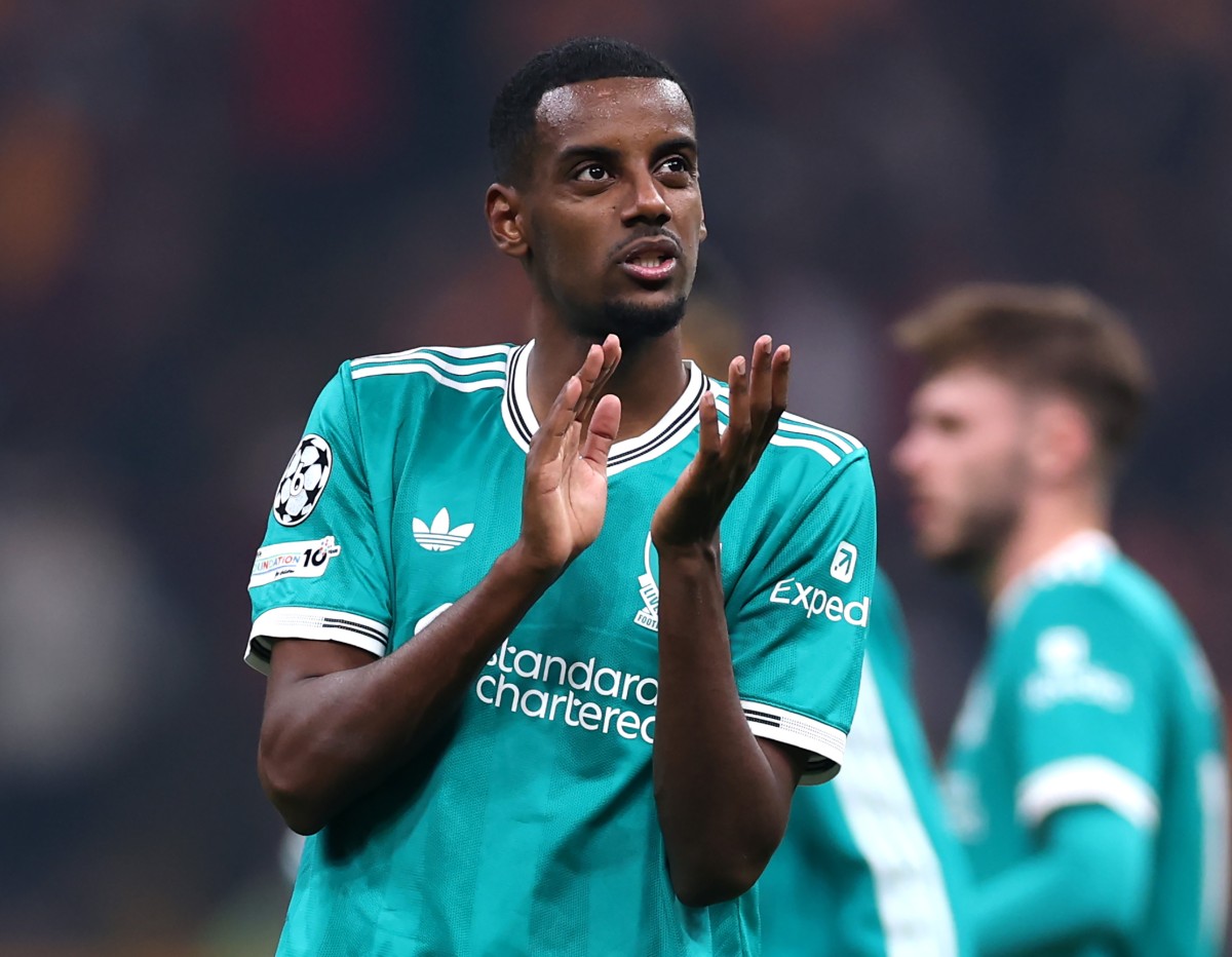 Alexander Isak applauds the Liverpool fans