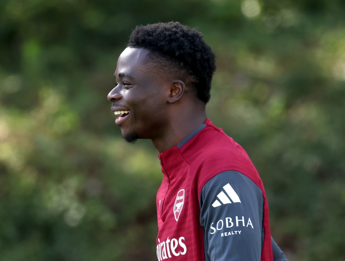 Bukayo Saka laughing during Arsenal training