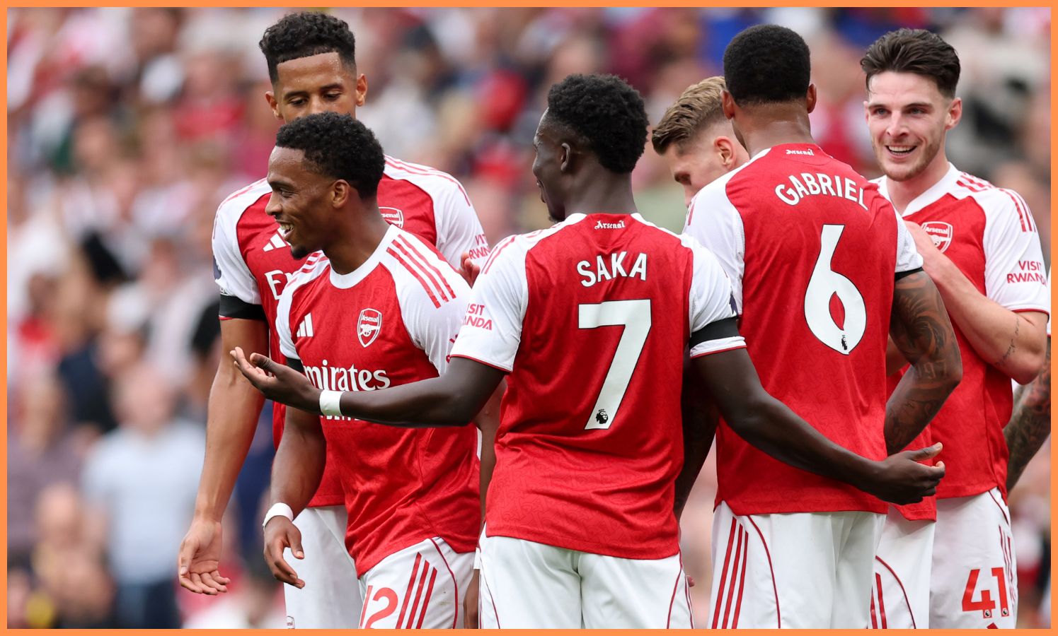 Jurrien Timber celebrates with his Arsenal teammates after scoring against Leeds
