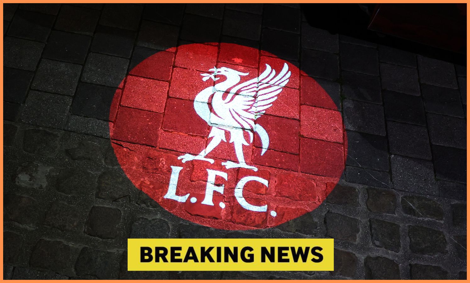 Liverpool FC logo and 'breaking news' banner