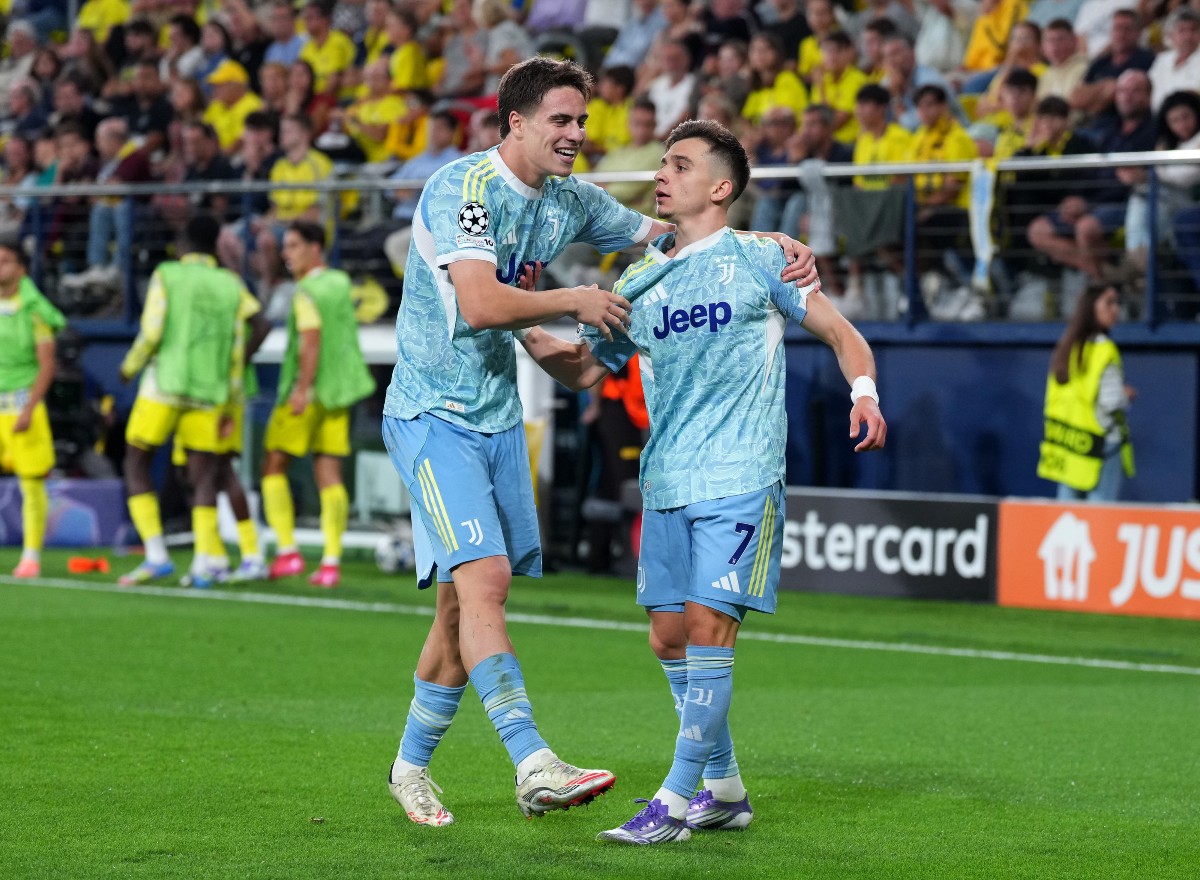 Kenan Yildiz celebrates with Juventus teammate Francisco Conceicao
