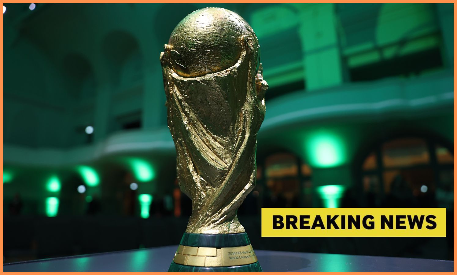 World Cup trophy and 'breaking news' banner