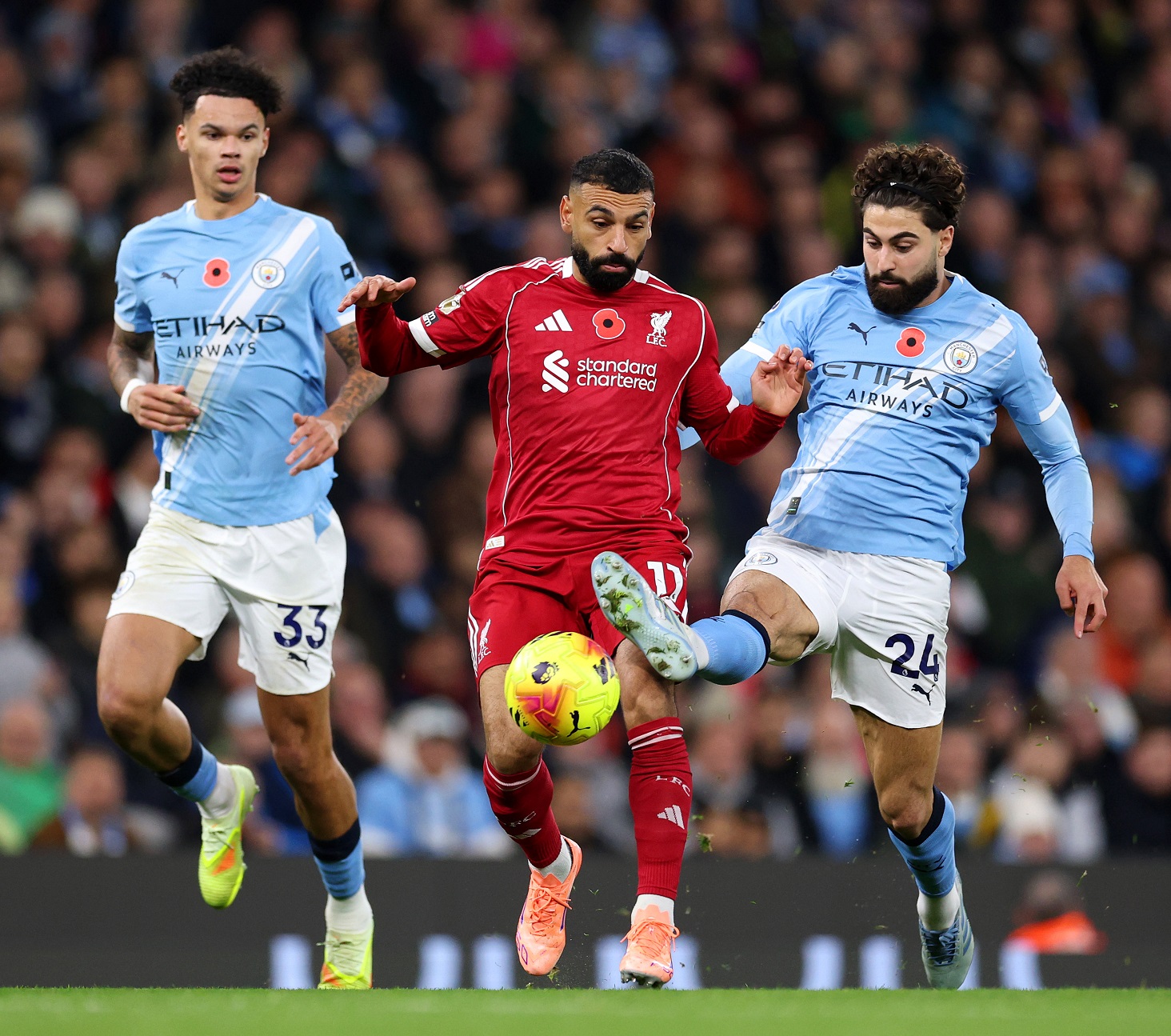 Mohamed Salah of Liverpool is challenged by Josko Gvardiol of Man City