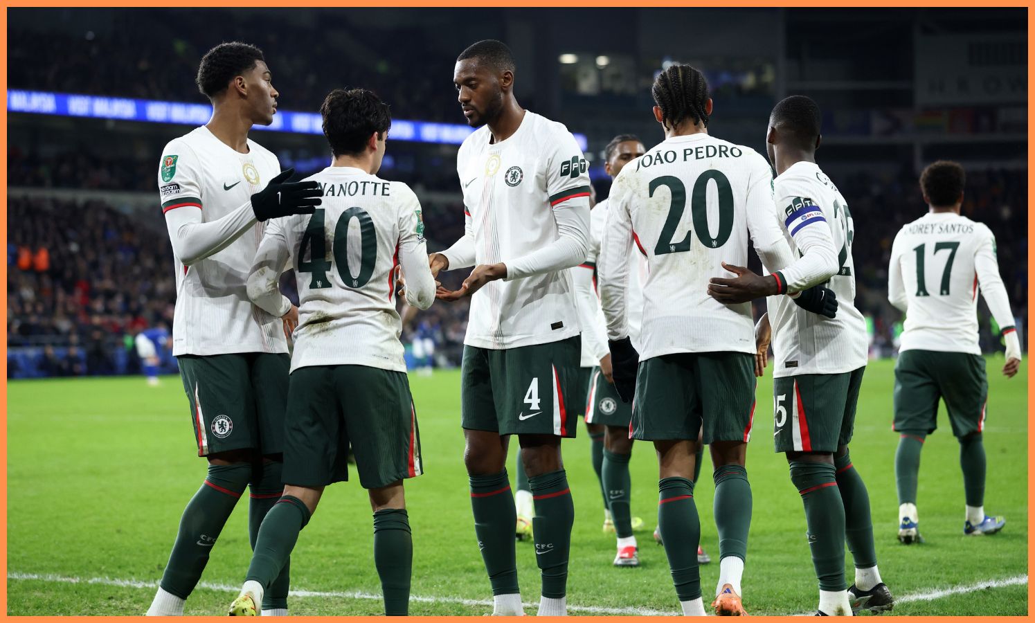 Josh Acheampong celebrates with his Chelsea teammates