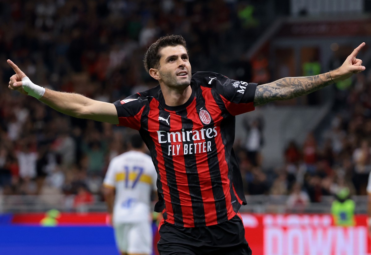 Christian Pulisic celebrates a goal for AC Milan