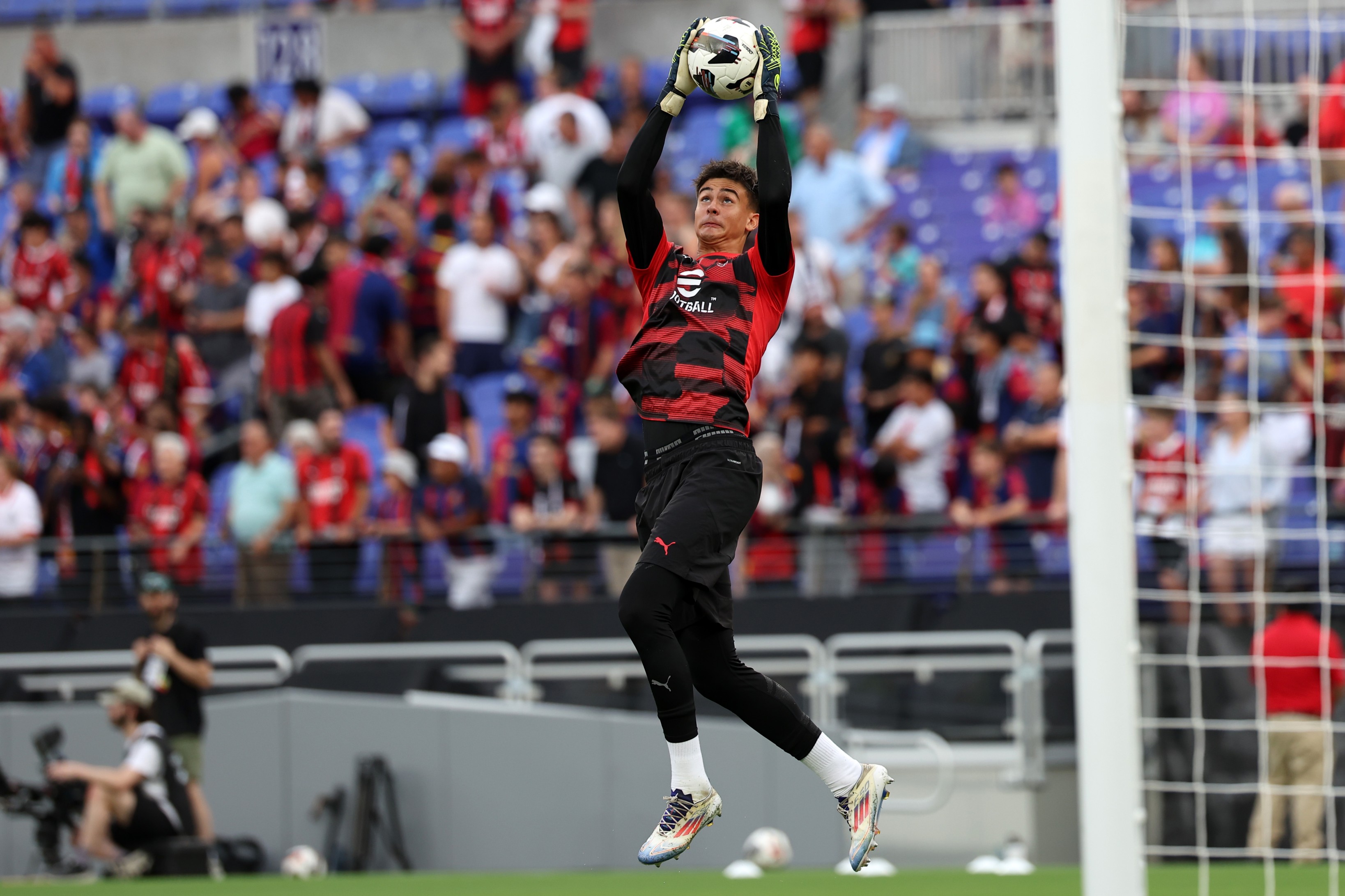 Lorenzo Torriani of AC Milan in action during warm up