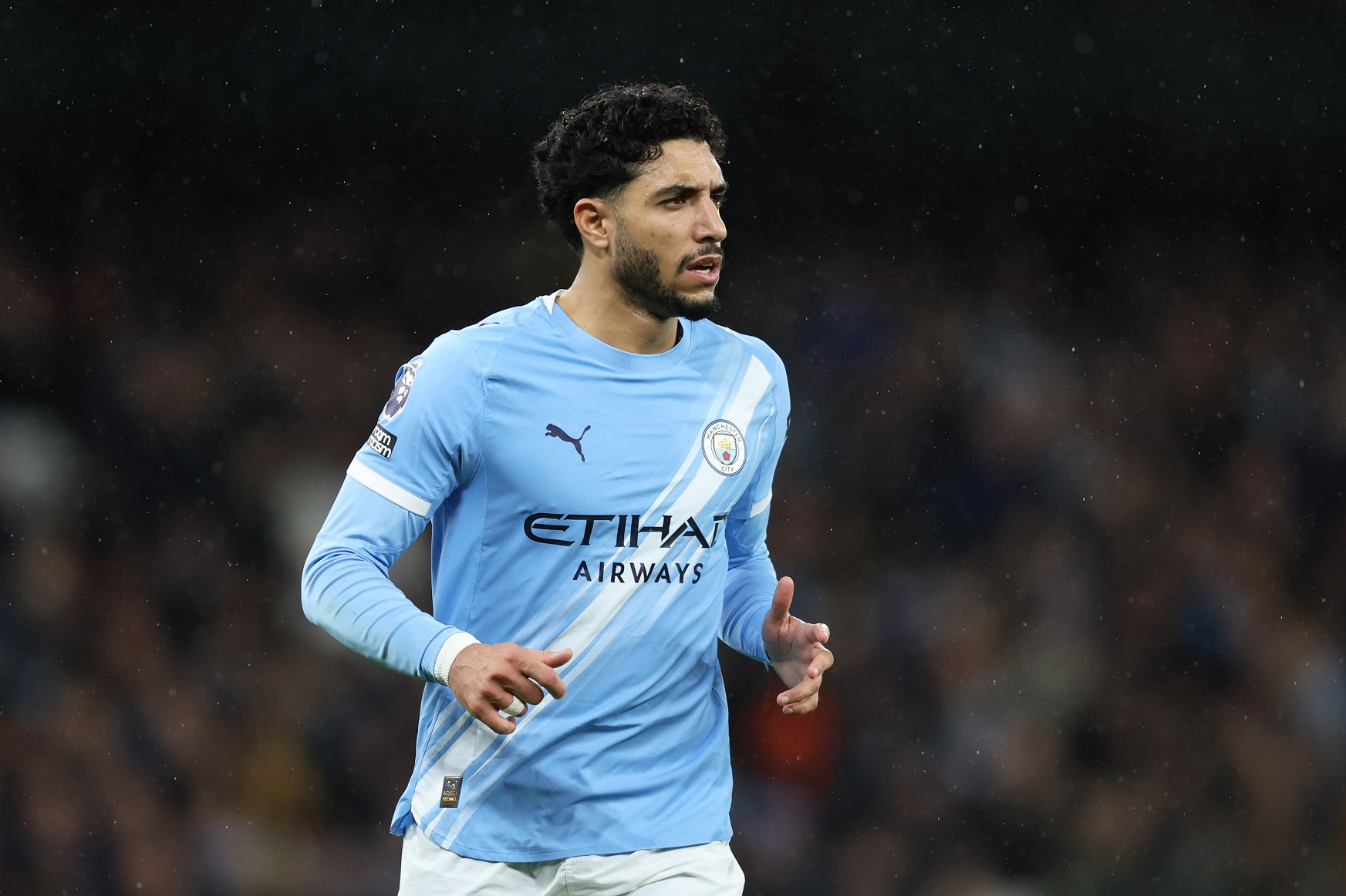 Omar Marmoush of Man City looks on