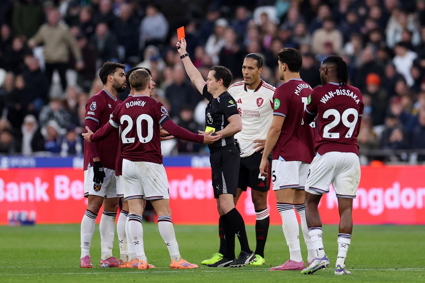 Darren England shows a second yellow and subsequent red card to Lucas Paqueta of West Ham