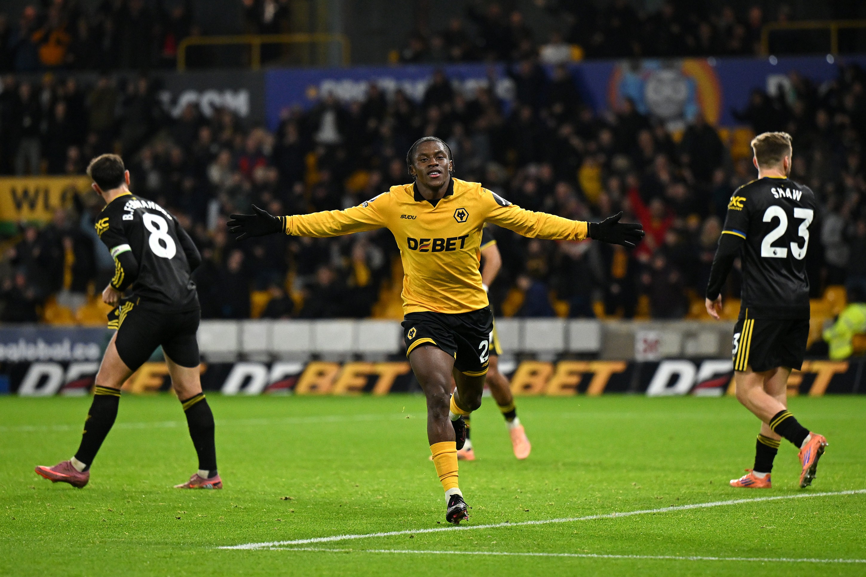  Jean-Ricner Bellegarde of Wolverhampton Wanderers celebrates scoring his team's first goal