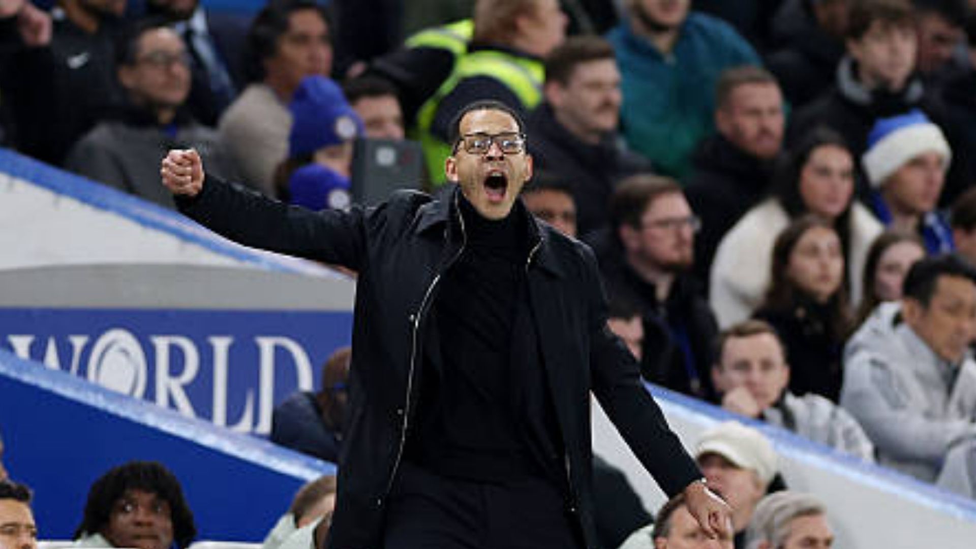 Liam Rosenior, Manager of Chelsea, reacts during the Carabao Cup Semi Final First Leg match between Chelsea and Arsenal at Stamford Bridge