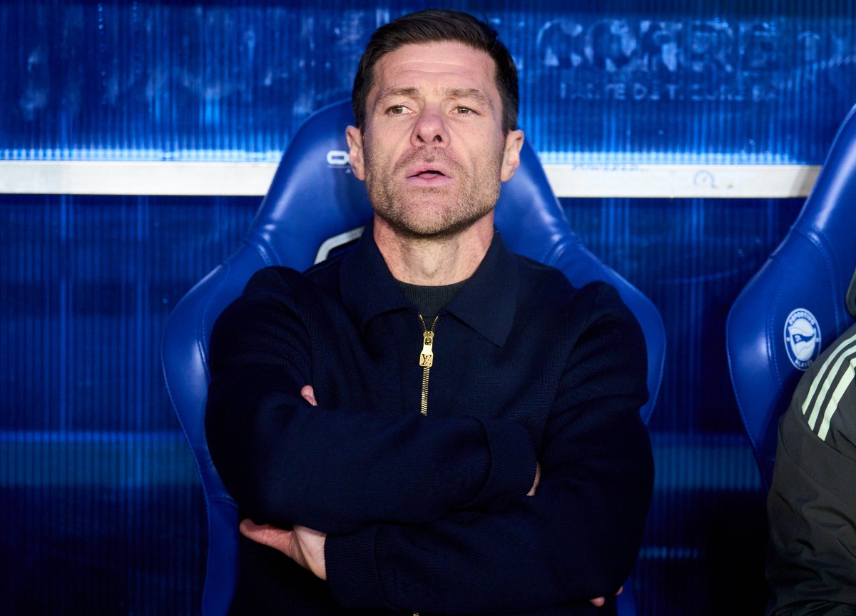 Xabi Alonso looks on