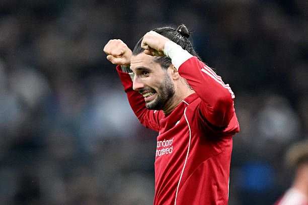 Dominik Szoboszlai of Liverpool celebrates after teammate Cody Gakpo (not pictured) scores his team's third goal during the UEFA Champions League 2025/26 League Phase MD7 match between Olympique de Marseille and Liverpool FC at Stade de Marseille on January 21, 2026 in Marseille, France.