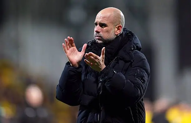 Pep Guardiola, Manager of Manchester City, reacts as he applauds the fans after the UEFA Champions League 2025/26 League Phase MD7 match between FK Bodo/Glimt and Manchester City at Aspmyra Stadion