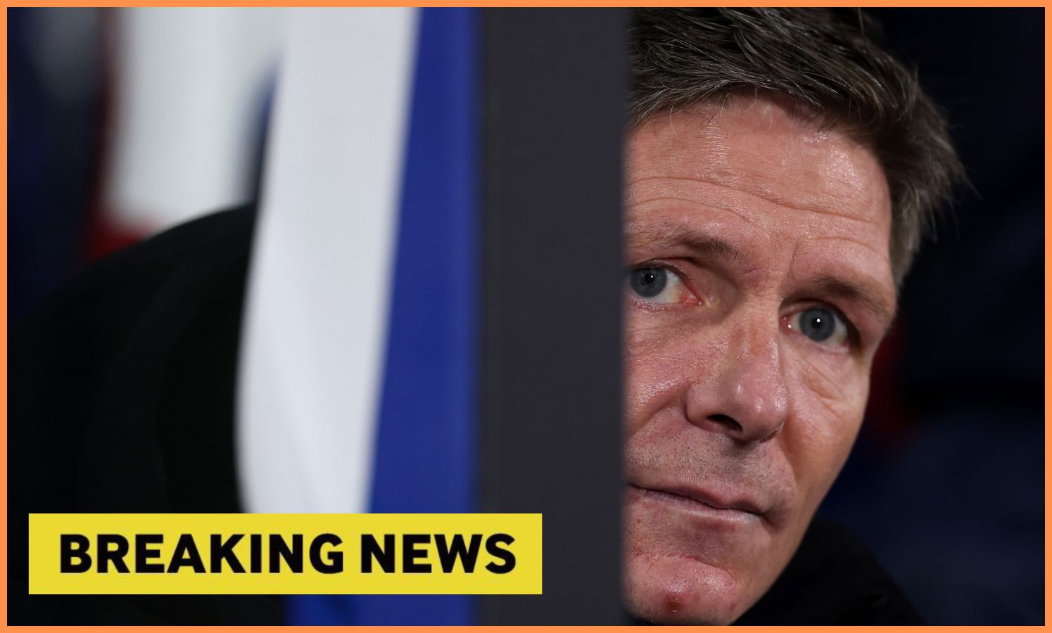 Oliver Glasner looks on, plus 'breaking news' banner