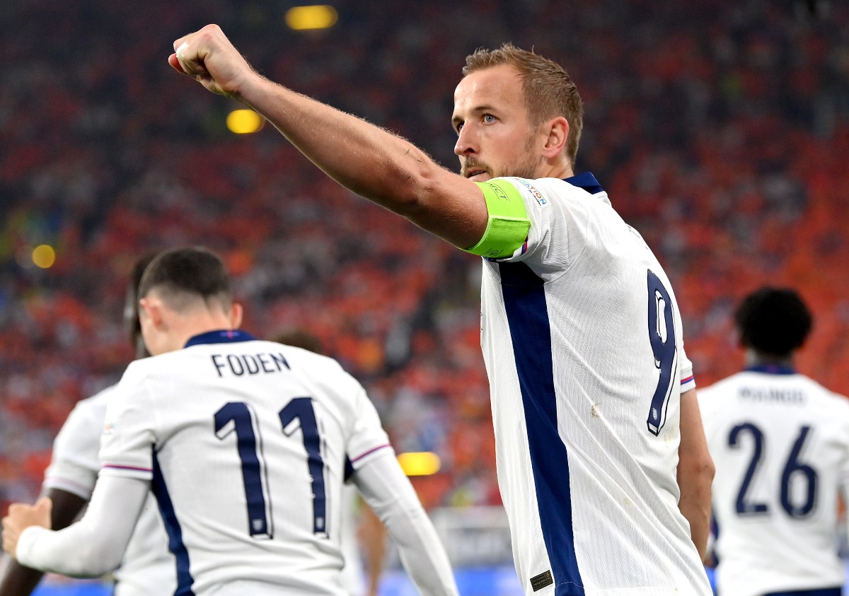 Harry Kane celebrates scoring for England at Euro 2024
