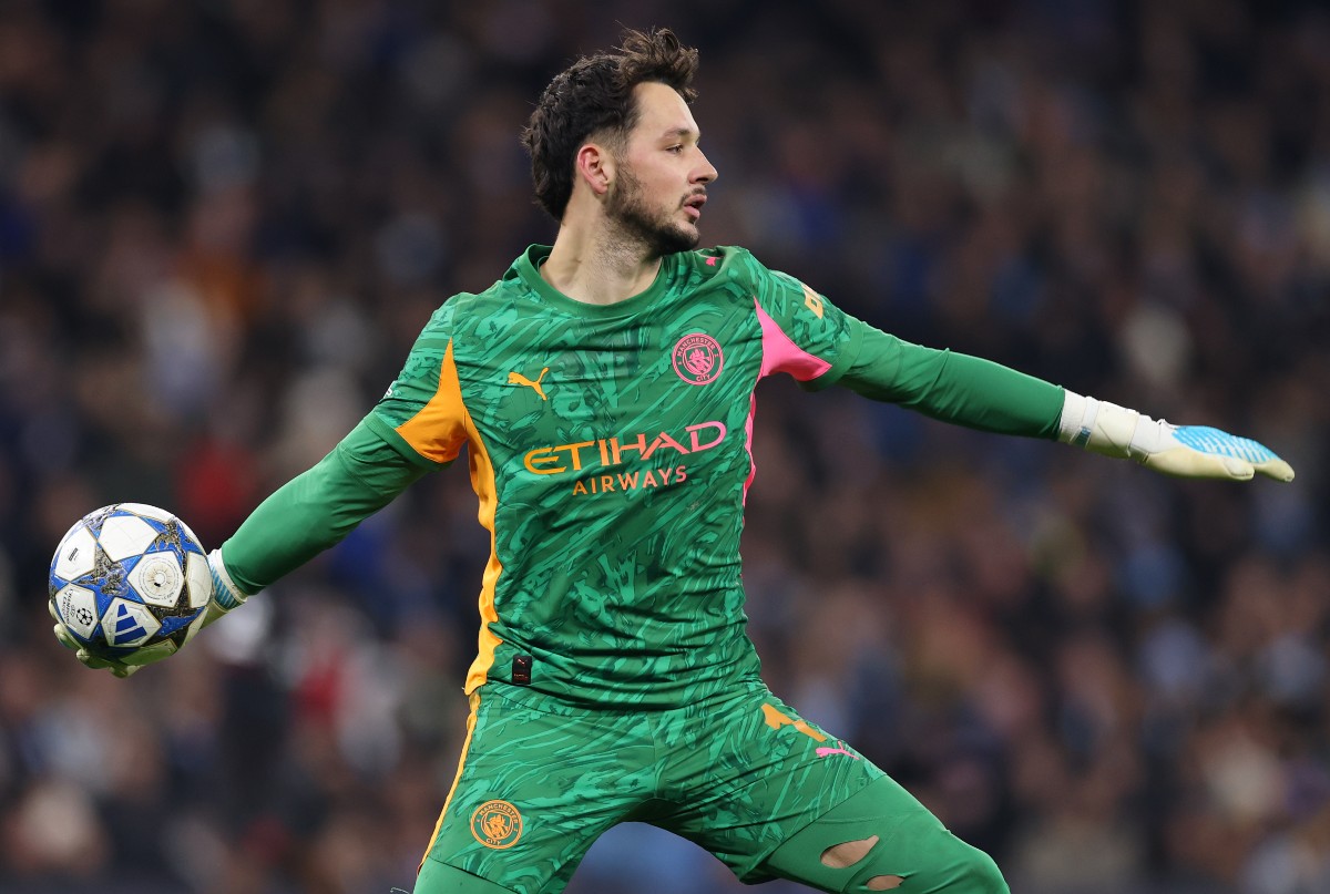 Man City goalkeeper James Trafford in action
