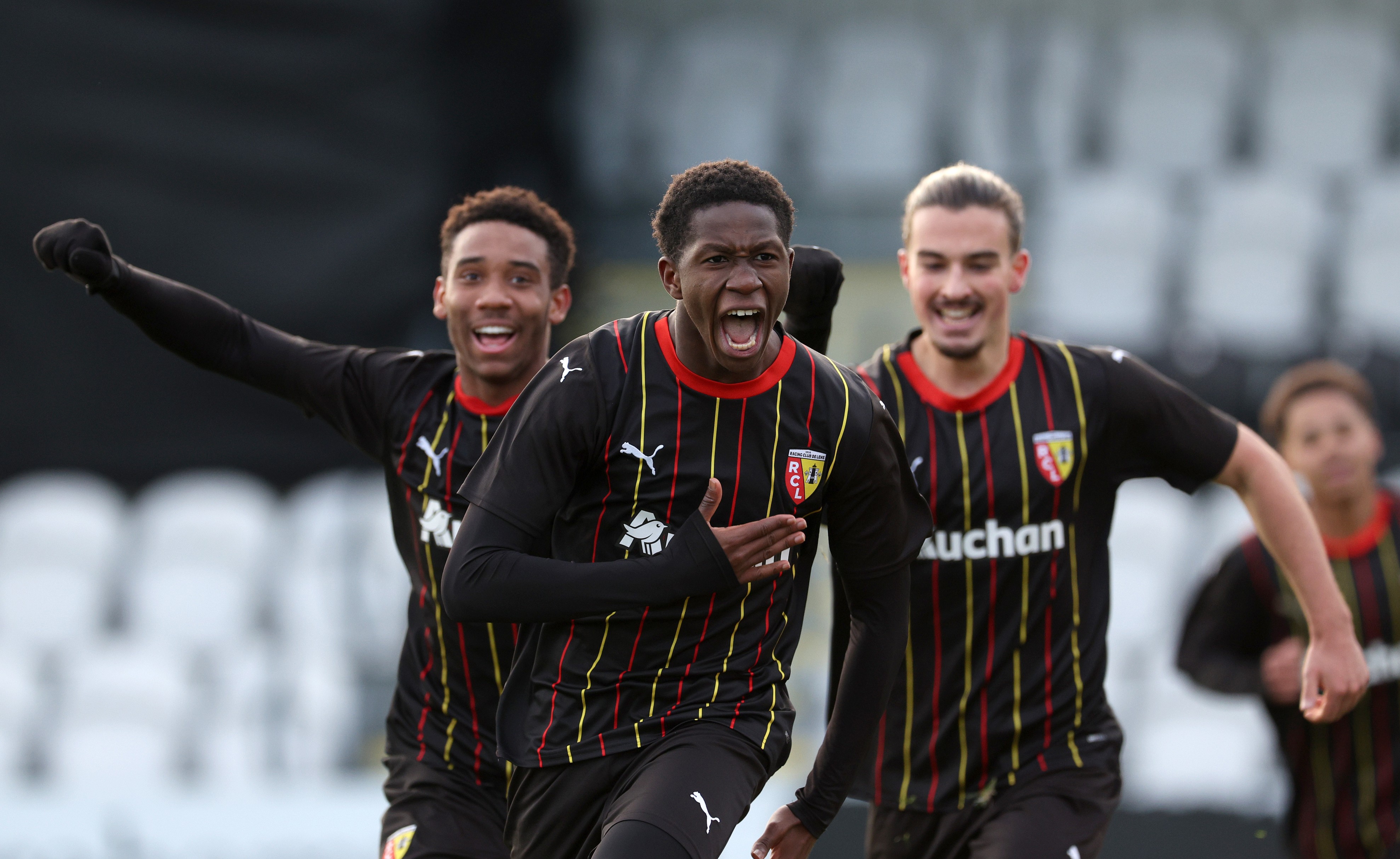 Rayan Fofana of Lens celebrates scoring