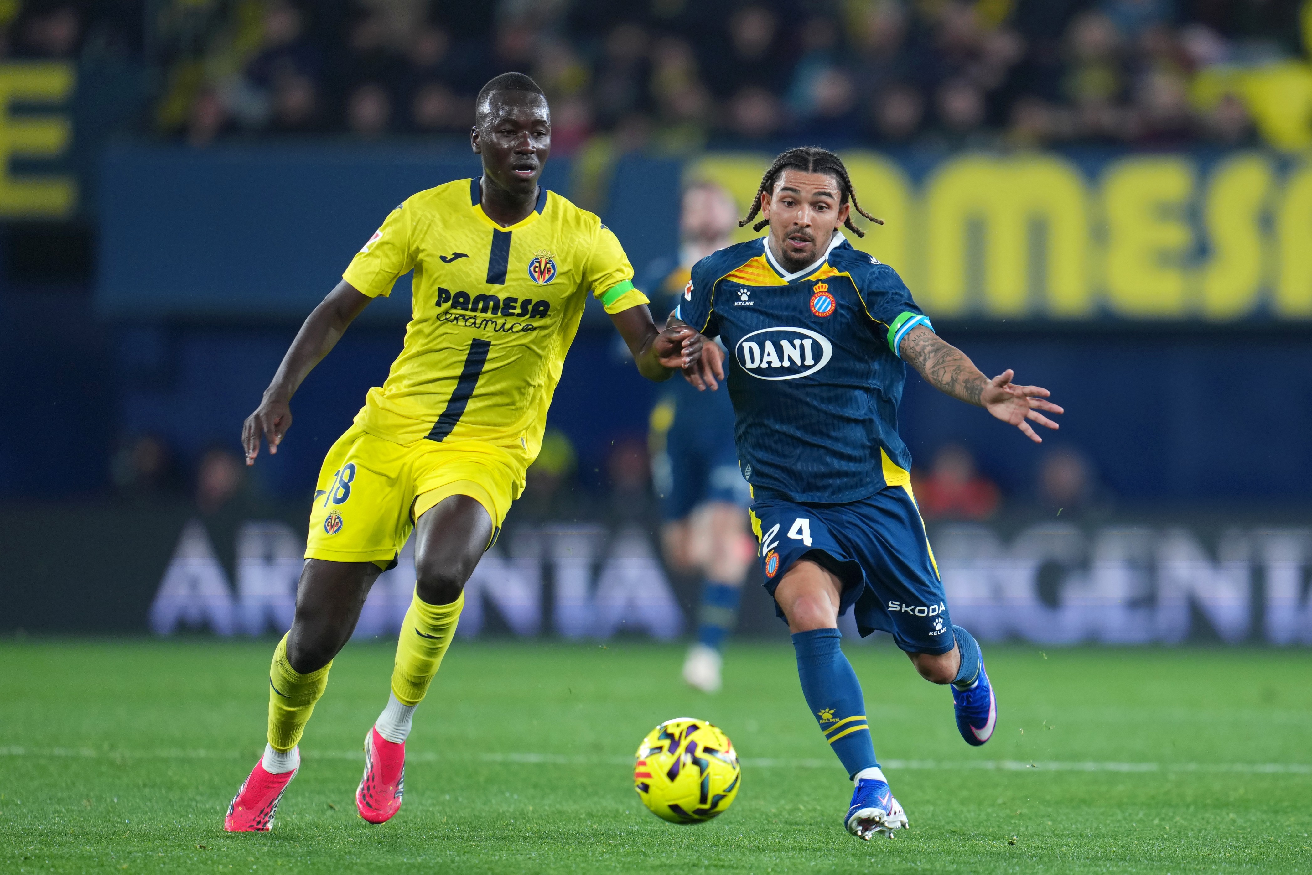 Pape Gueye of Villarreal battles for the ball