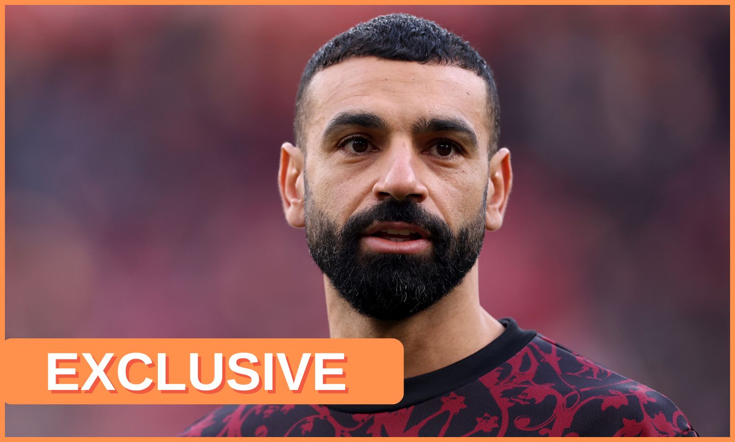 Mohamed Salah looks on, plus 'exclusive' banner